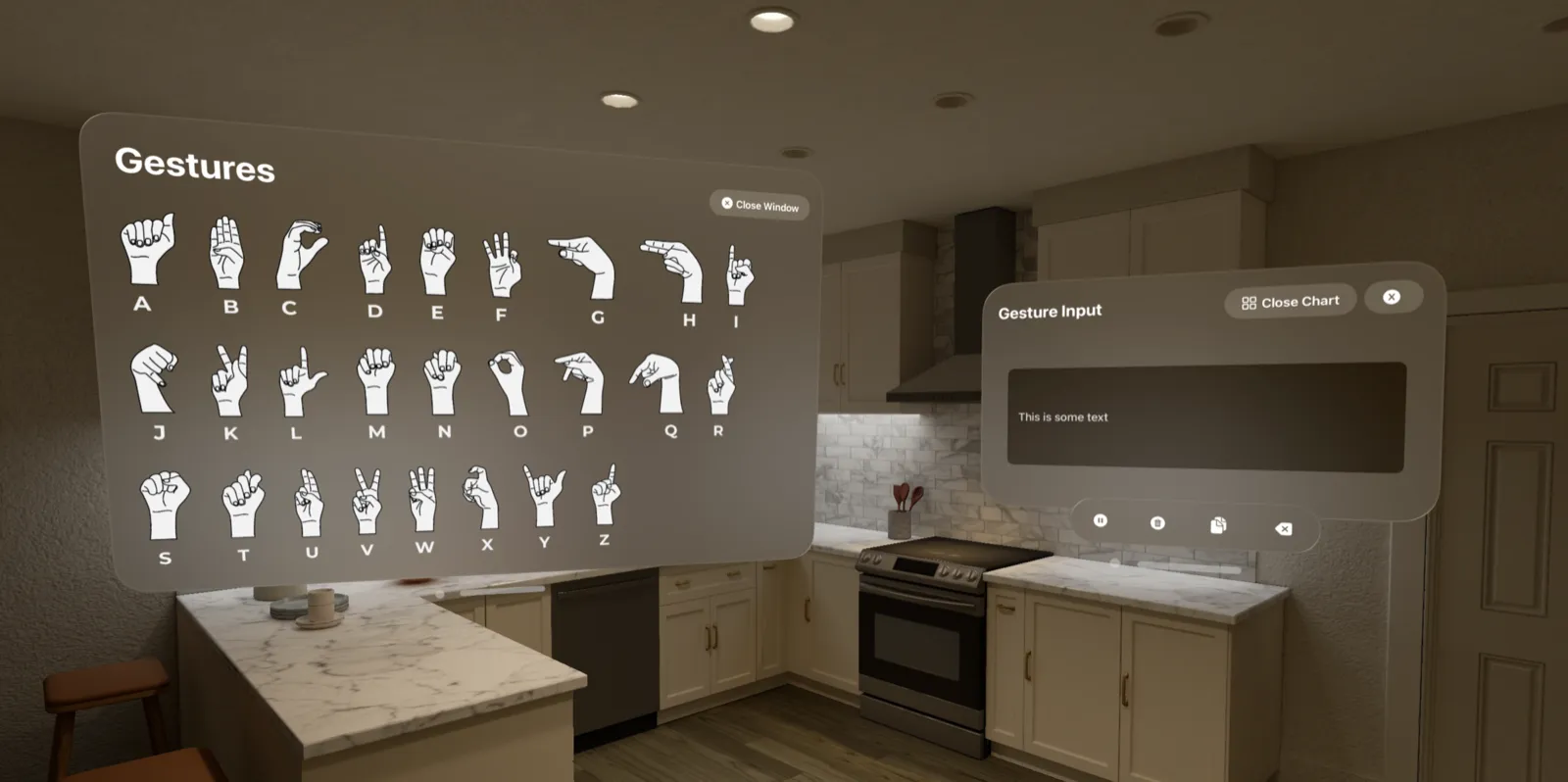 The built gesture chart: a window showing the hand sign for every letter from A to Z, beside the Gesture Input window.