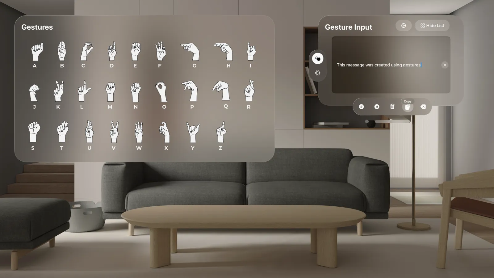 The gesture input design: a panel of hand signs for each letter of the alphabet beside a Gesture Input text field reading “This message was created using gestures.”